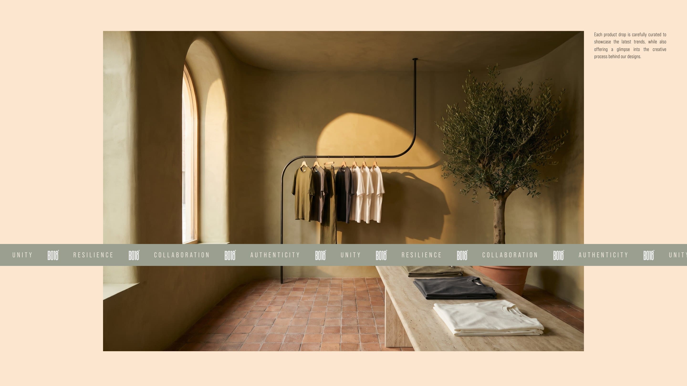 The BO18 boutique in olive plaster and terracotta, a rail of essentials and an olive tree in the late sun, with the band of the brand keywords across it