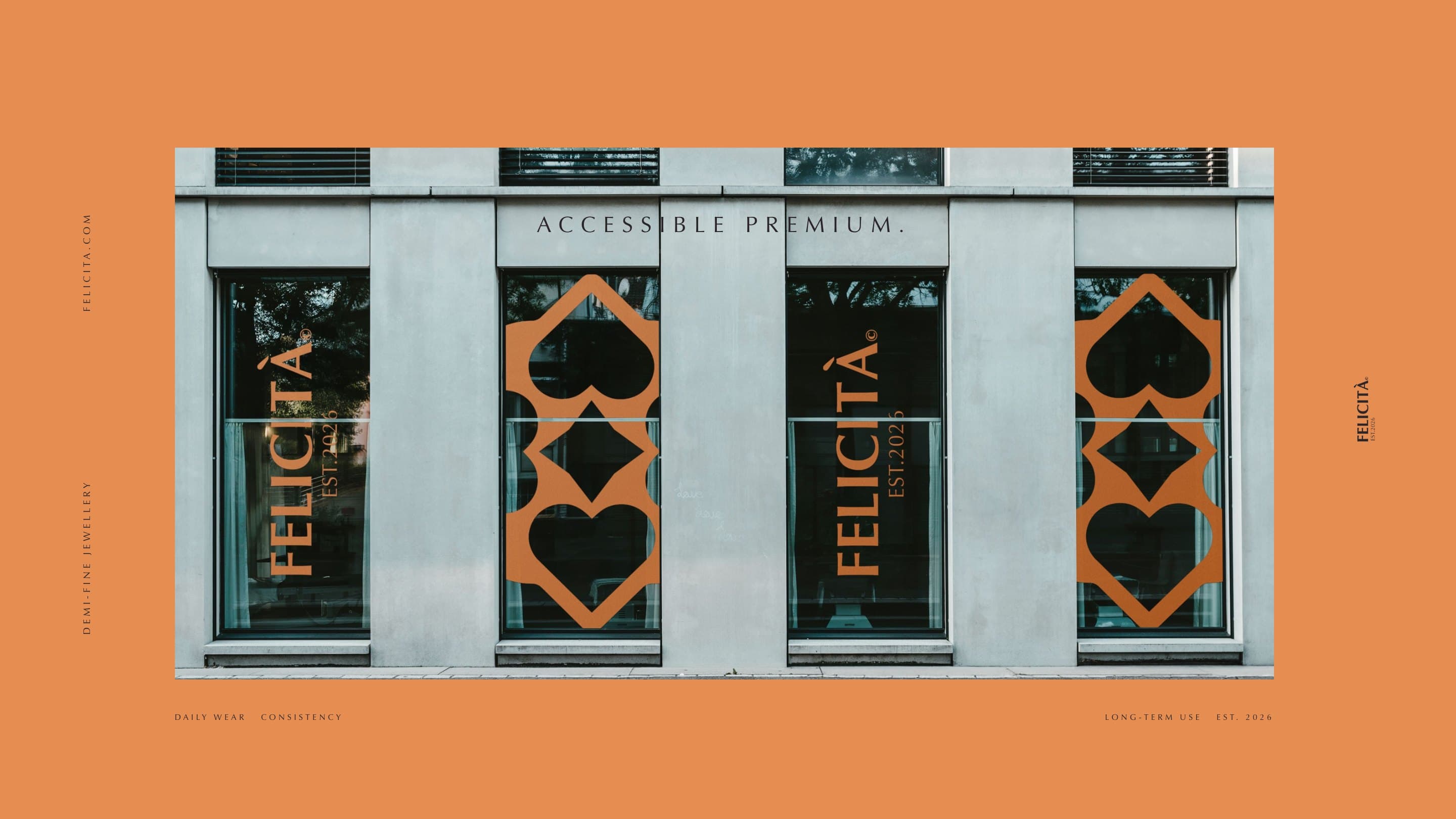 The Felicità shopfront: the wordmark and the quatrefoil set in Warm Gold across its windows, Accessible premium on the stone