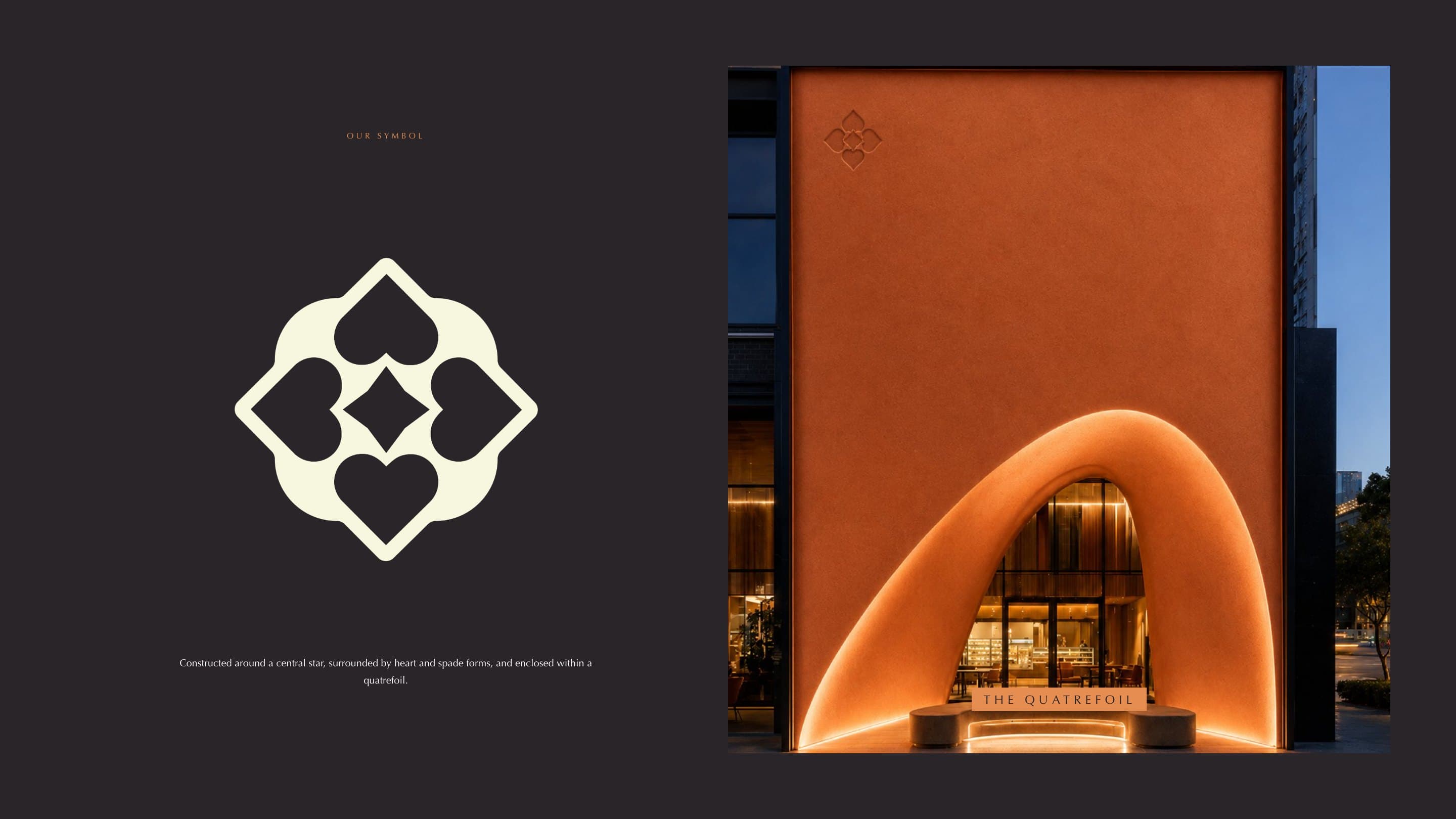The emblem in ivory on charcoal, a star within hearts, spades and a quatrefoil, beside the arched storefront