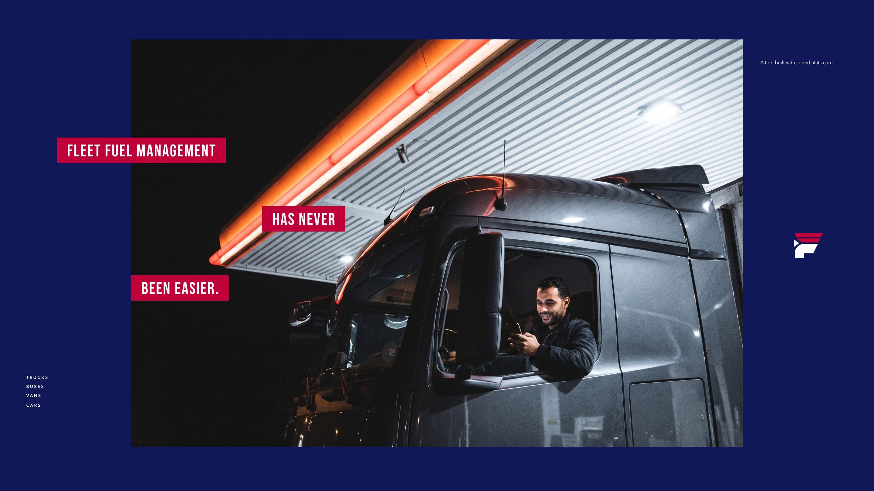 A driver smiles at his phone from his truck's cab under a station canopy's glowing line: Fleet fuel management has never been easier.